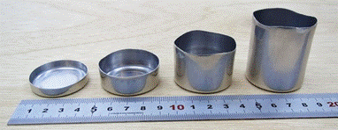 絞りスピニング加工による内径40 mmの円筒形成形品（左から素材直径50, 60, 70, 80 mm）